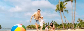 Family on Siloso Beach, Sentosa — Mastercard 1-for-1 attractions promo